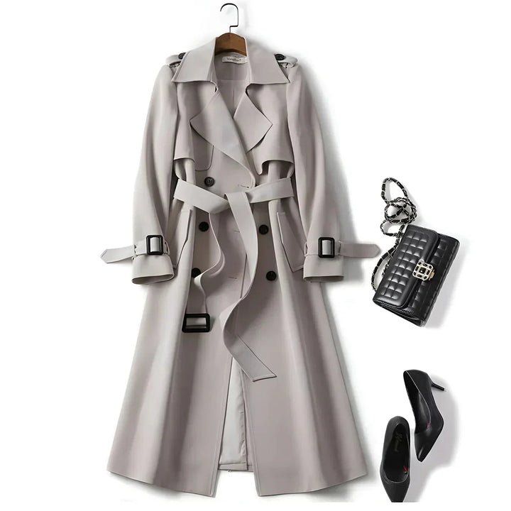 Back view of a women's belted trench coat, double-breasted, showing its versatile autumn fashion appeal.