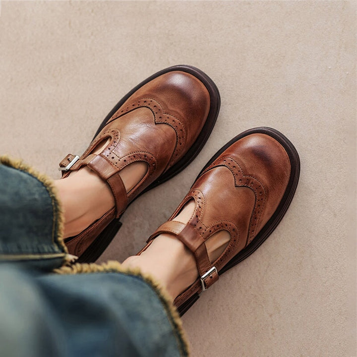 Classic women's Mary Jane sandals with adjustable strap for all-day comfort.
