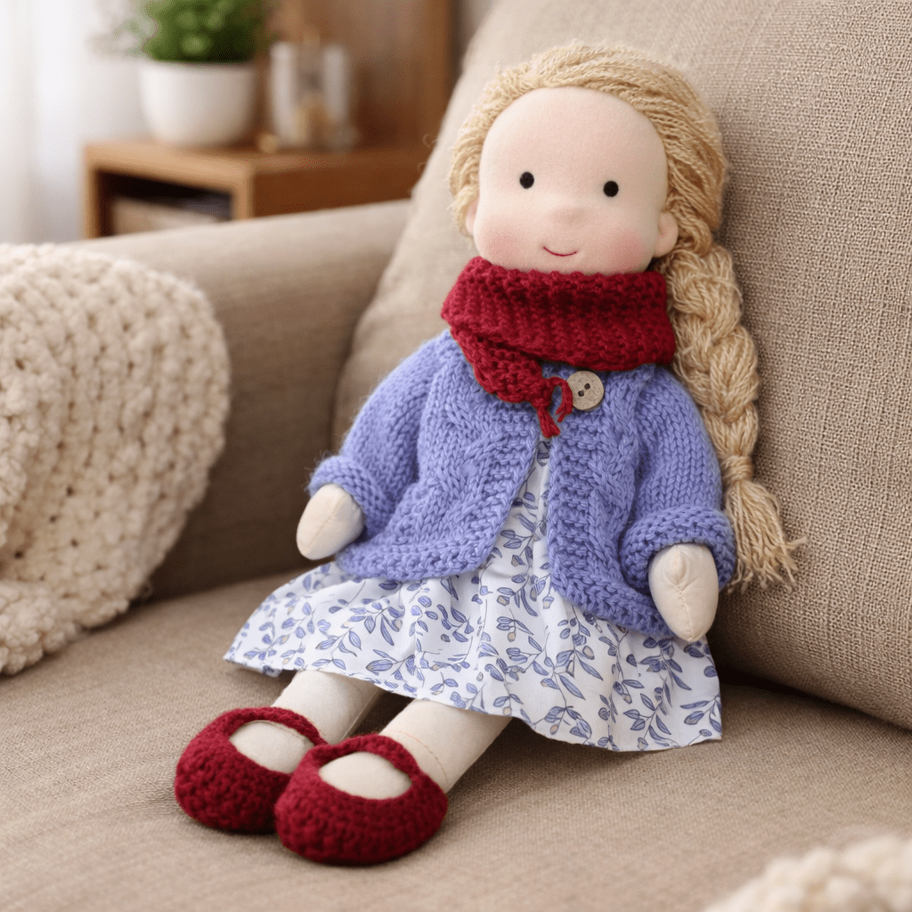 Soft cotton Waldorf doll, an artisan-crafted plush toy designed for creative kids' play.