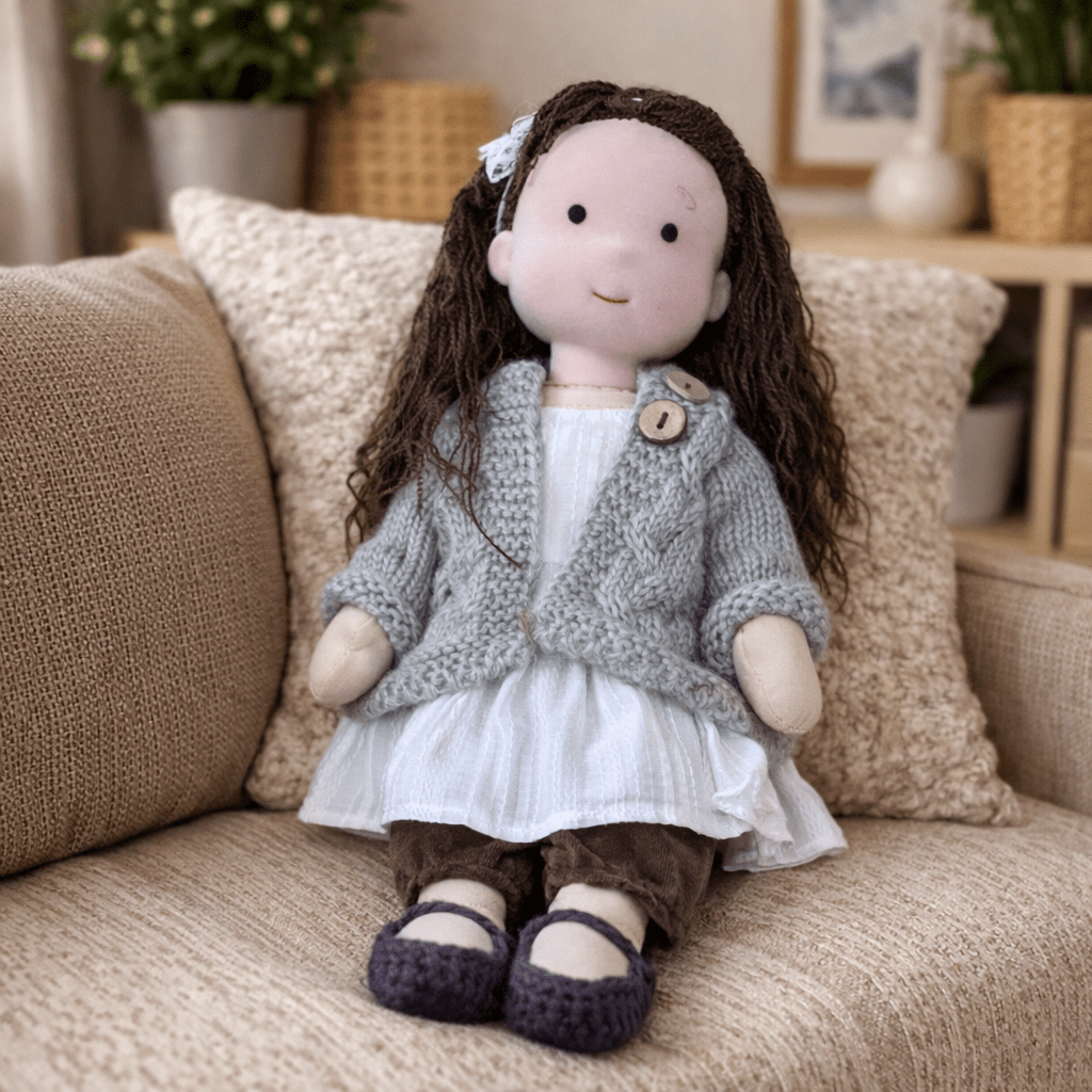 Handcrafted Waldorf doll, a cuddly cotton plush toy, designed for children's creative fun.