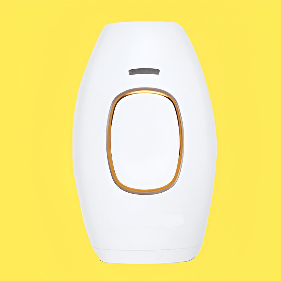 Ergonomic women's laser hair removal device for painless at-home permanent hair reduction.