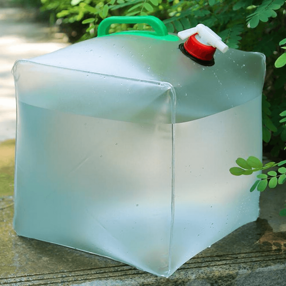 Collapsible water bottle, blue, folded for portable travel; eco-friendly outdoor gear for hiking, camping