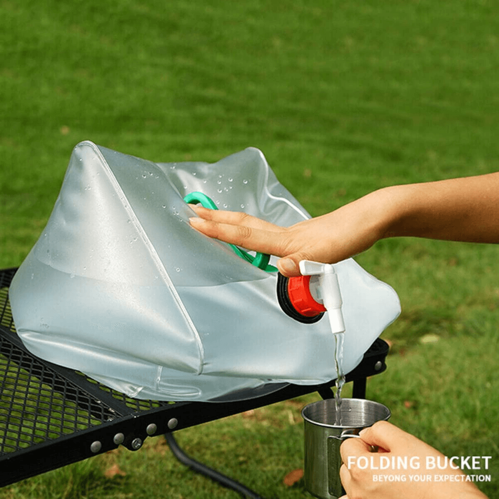 Flexible silicone water bottle, gray, expanded, ready for camping; lightweight, portable hydration solution