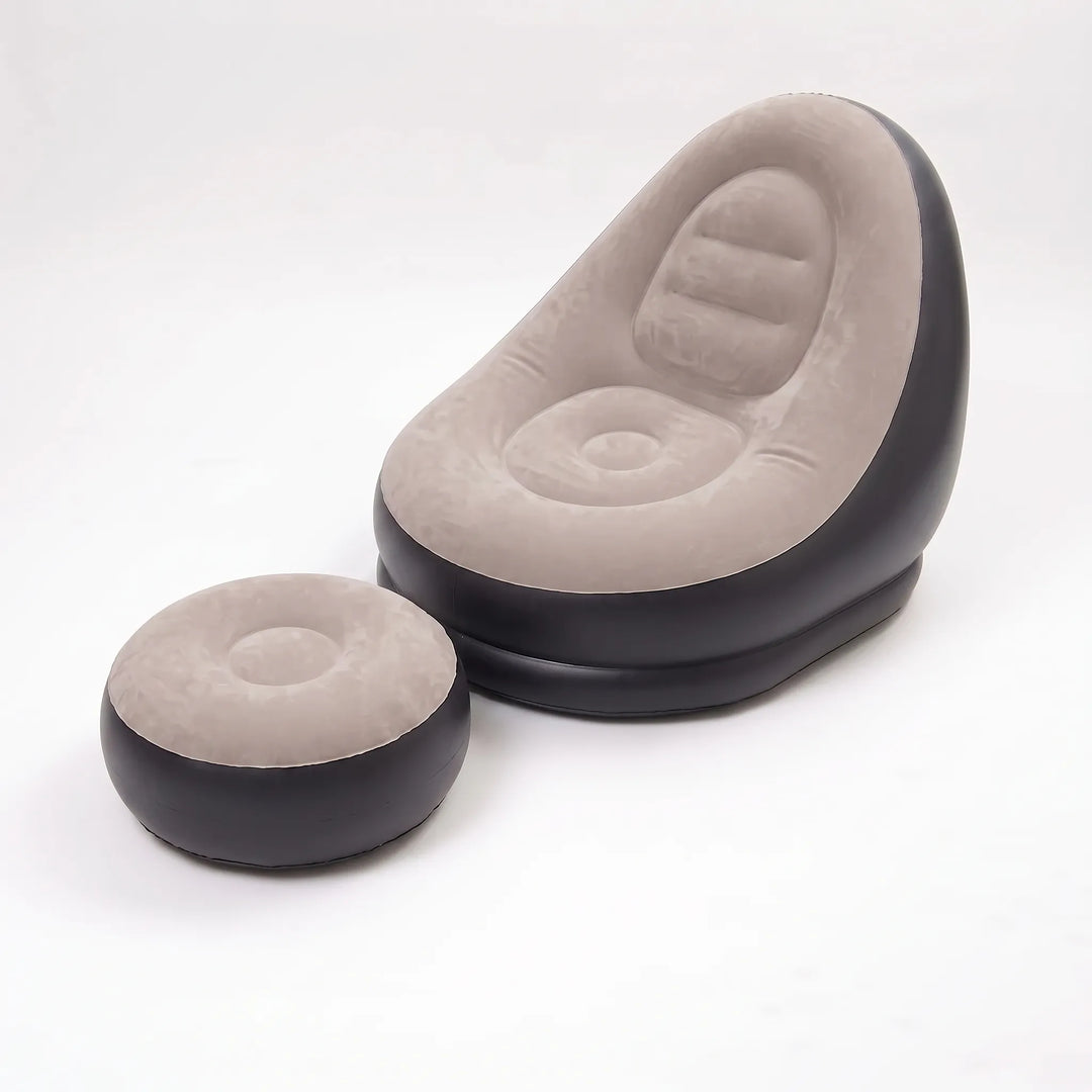 Portable inflatable lounge chair & footrest, ideal for patio, pool, or camping relaxation.
