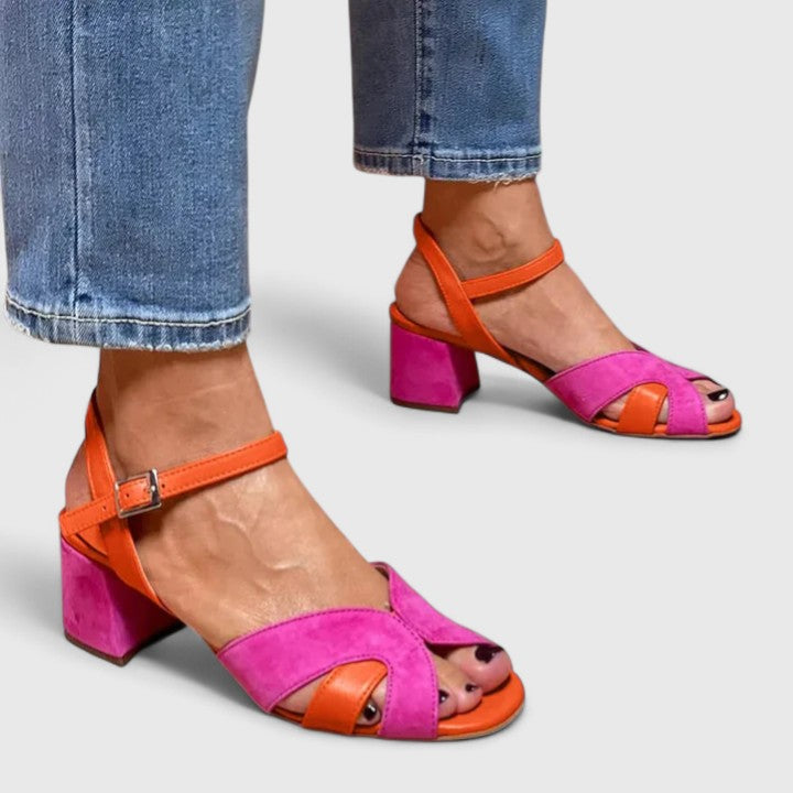 Comfortable pink strappy wedge heel sandals for women, perfect for summer casual wear.