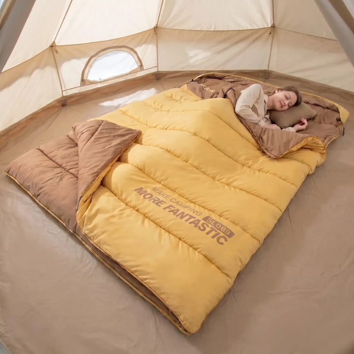 Comfortable unisex double sleeping bag for 2, perfect for camping and outdoor adventures. Ultimate sleeping comfort.