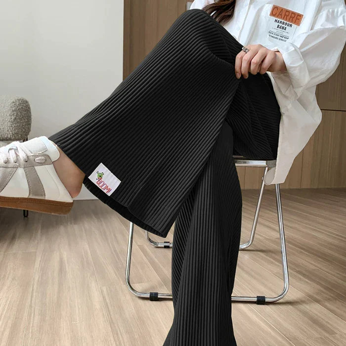 Stylish high-waisted wide leg maternity pants, comfortable stretch for women's modern pregnancy fashion.