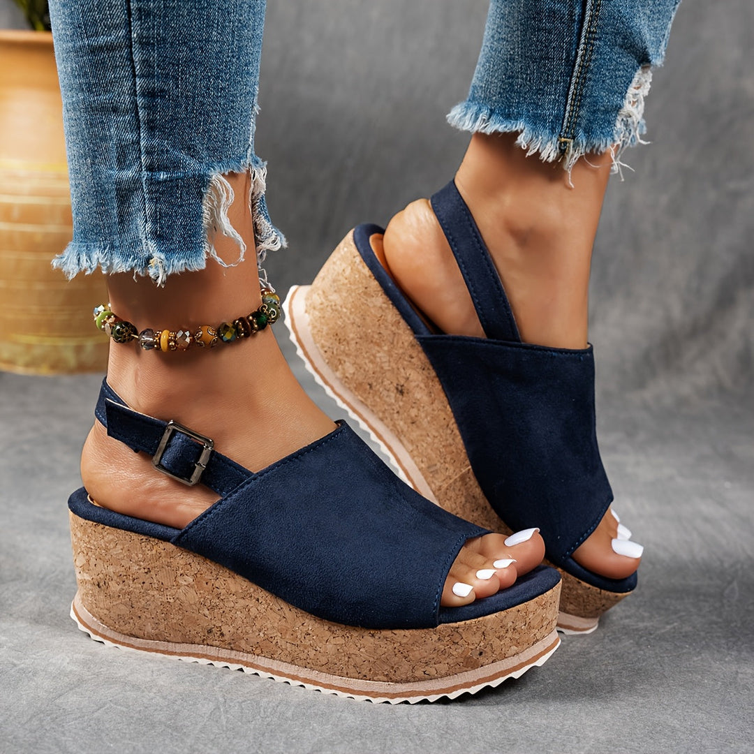Open-toe women's platform sandals with adjustable straps, offering comfortable support for summer activities.