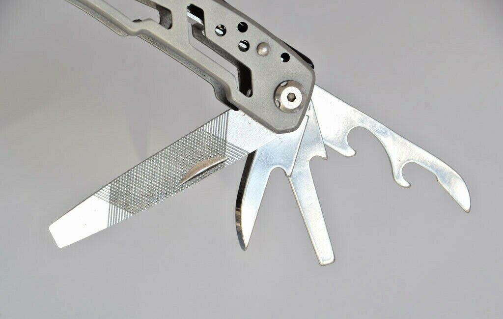 Detailed view of pocket knife blade on 14-in-1 multitool, stainless steel
