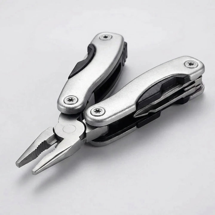 Unisex 9-in-1 folding multi-tool in hand, ready for outdoor camping, hiking, and survival tasks.