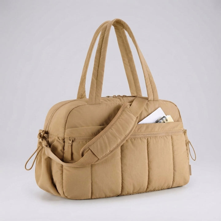 Black Aerelle compact lightweight duffel bag, showcasing its sleek design for travel, gym, or weekend use.
