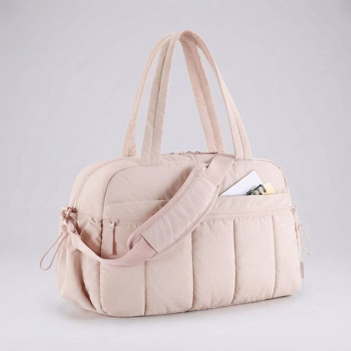 Empty Aerelle compact lightweight travel duffel bag, highlighting its spacious yet foldable, water-resistant design.