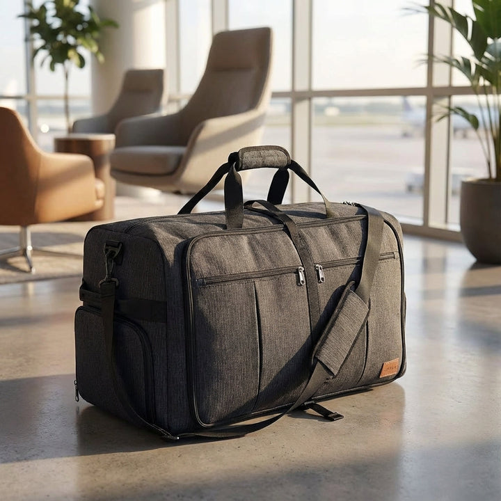 Compact, black FlexiHaul foldable travel duffel bag. Unisex extra large polyester luggage for easy storage.