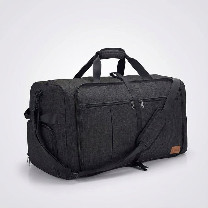 Durable black polyester FlexiHaul foldable travel duffel bag, extra large capacity for luggage and storage.