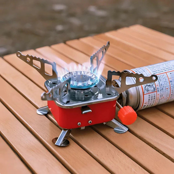 Compact foldable gas stove for outdoor cooking, perfect for camping and hiking trips, portable design