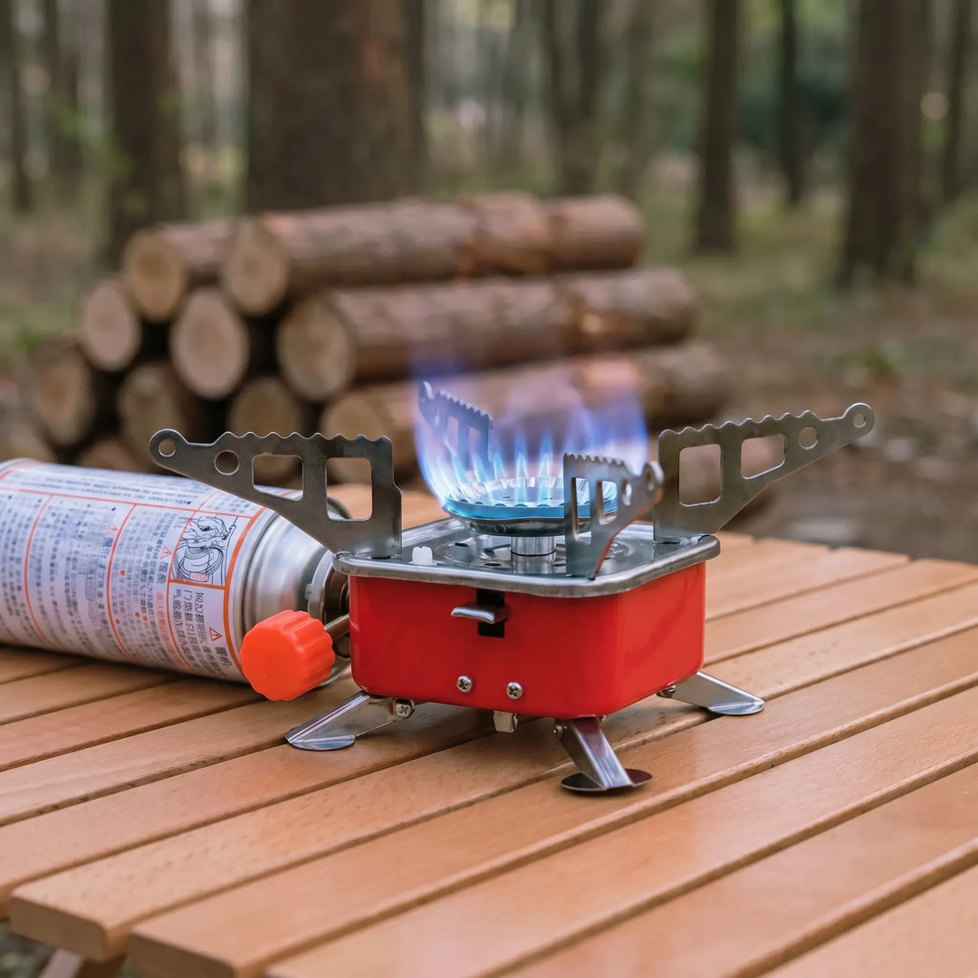 Compact folding camping stove, perfect for outdoor cooking during hiking and camping trips. Portable gas iron stove.