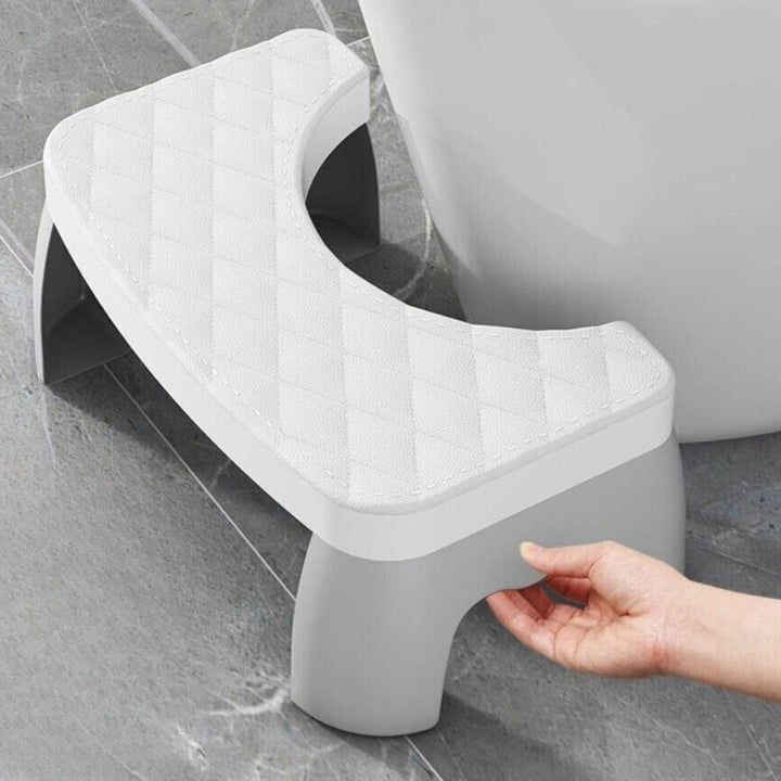 Convenient compact non-slip toilet stool, easily stores under the toilet. Essential bathroom aid for comfort.
