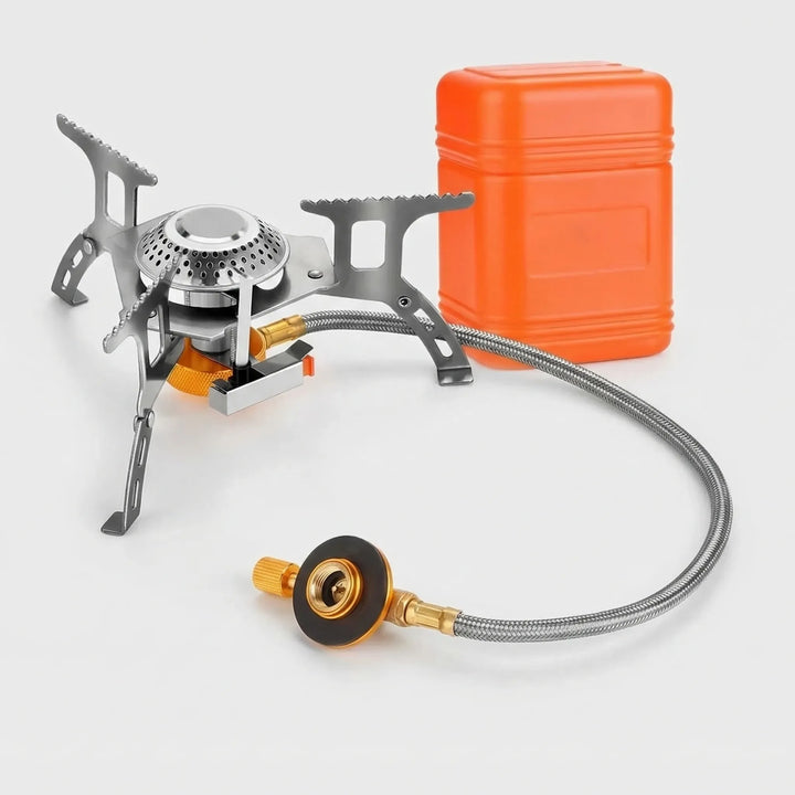 Gas camping stove ignited, boiling water on an outdoor trip. Essential portable cookware for hiking & travel cooking.