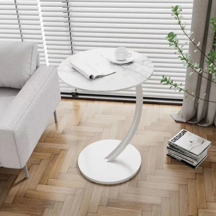 Elegant compact round side table, practical for small apartments, featuring a reinforced, durable design.