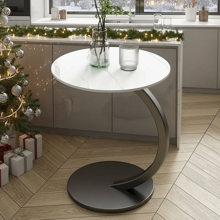 Reinforced compact round side table, a durable accent piece suitable for any small space or room.