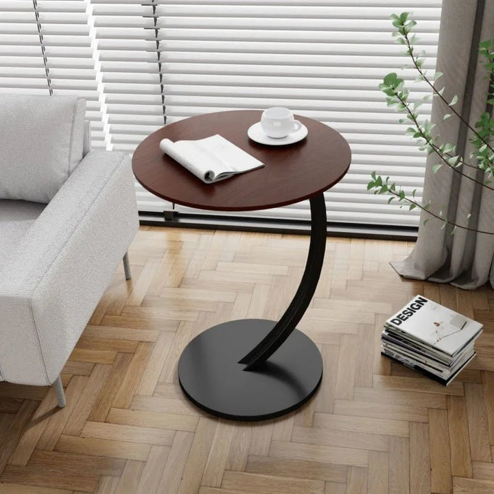 Modern round compact table with reinforced design, adding style and durability to small space living.