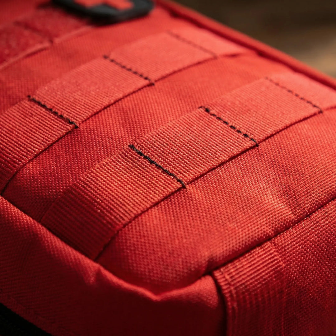 Rugged compact first aid pouch for hiking & outdoor adventures. Essential medical kit for survival & emergencies.