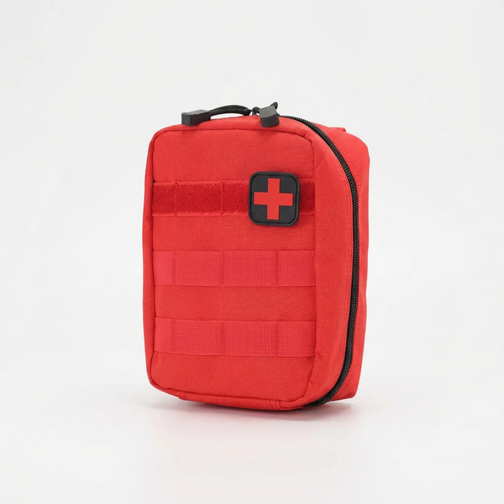 Emergency medical survival pouch, compact tactical design with MOLLE. Perfect for outdoor adventures & preparedness.
