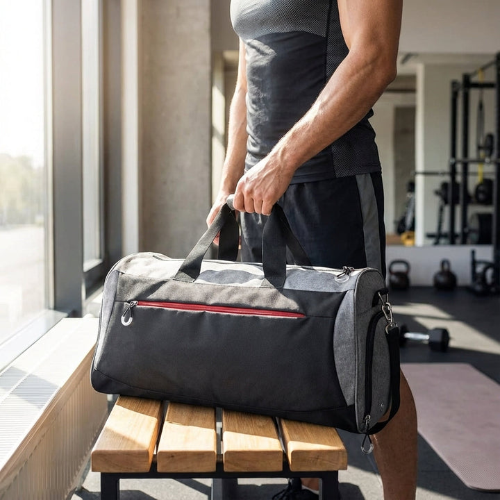 Compact unisex duffel bag with separate wet and shoe compartments, perfect for gym, travel, or sports.