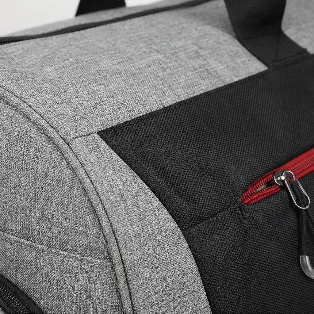 TravelDry 30L waterproof duffel bag with dedicated shoe and wet compartments for gym, sports, or travel.