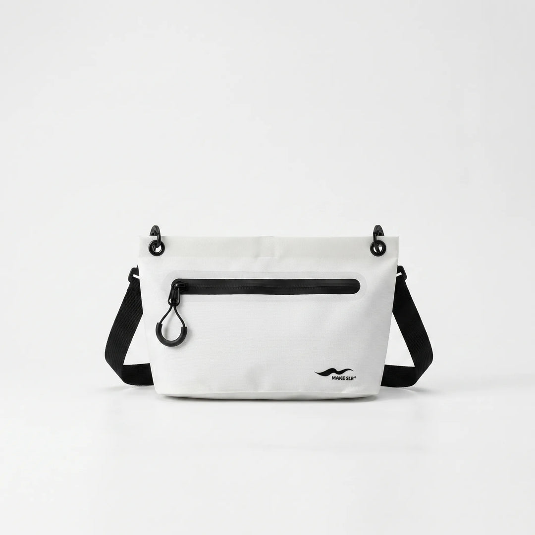 Small water-repellent dry bag for travel, beach, and protecting essentials.