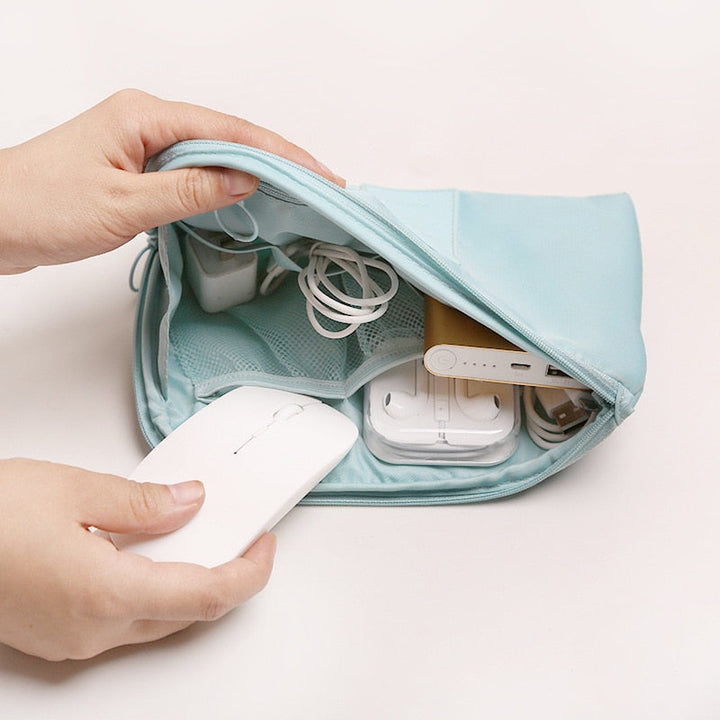 Essential gadget storage organizer bag, compact, waterproof, for all travel tech needs.