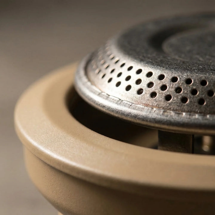 High-output windproof camping stove ensuring efficient outdoor cooking even in windy conditions. Essential hiking gear.