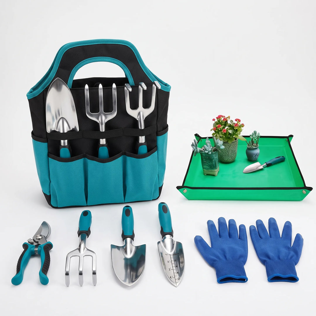 Assortment of garden hand tools: pruner, trowel, cultivator, weeder, spray bottle & gloves in a canvas tote.
