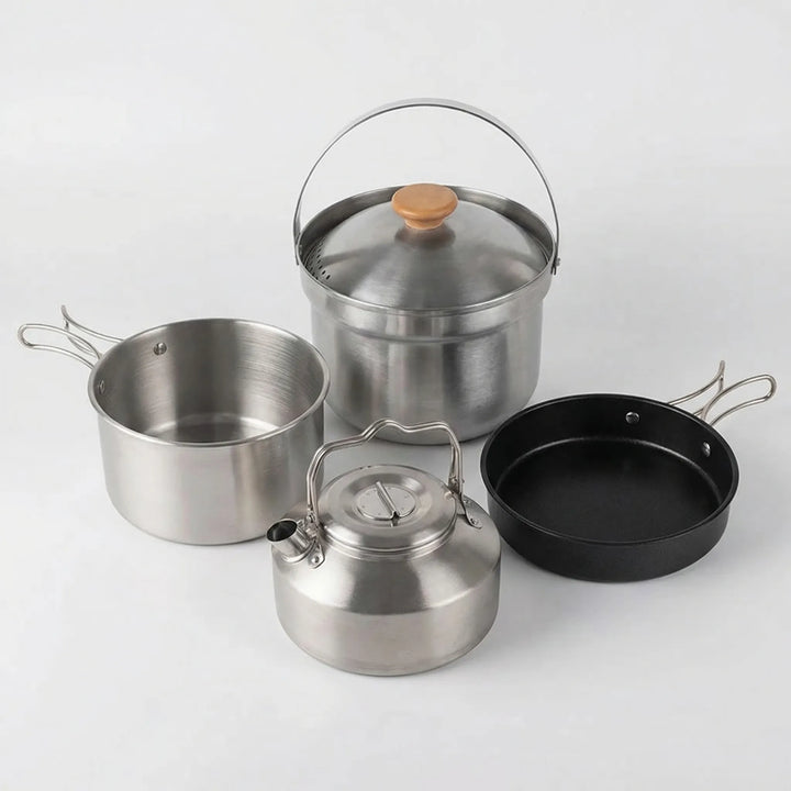 Durable camp kitchen cookware set with portable pot, frying pan, and kettle for bushcraft & outdoor cooking.