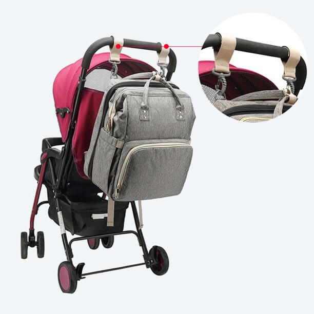 Organize all baby essentials in this multi-pocket convertible diaper backpack with bassinet feature.