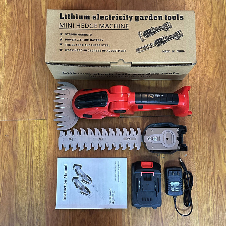 Detail of the handle and safety features on a mini garden hedge trimmer