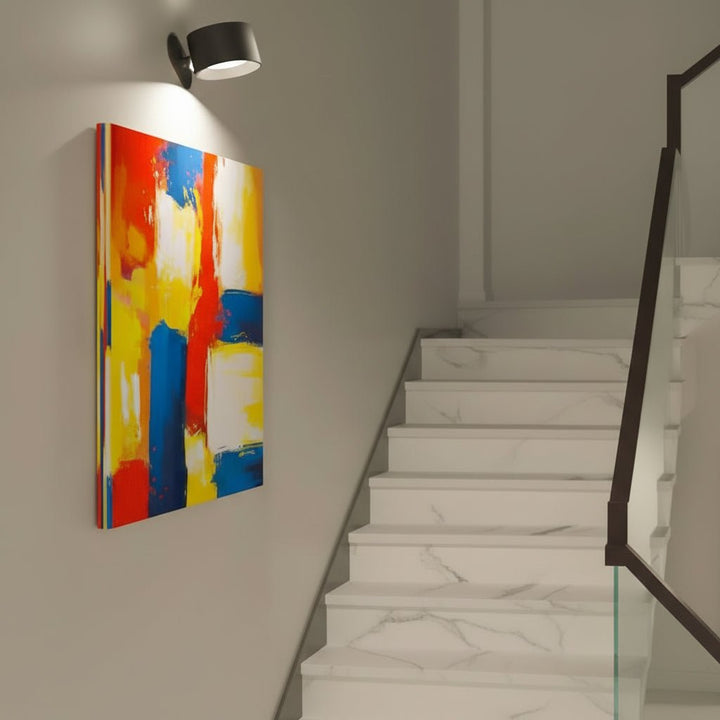 Versatile cordless LED wall lamp with 360° rotatable head for adjustable modern lighting. Ideal for reading & tasks.