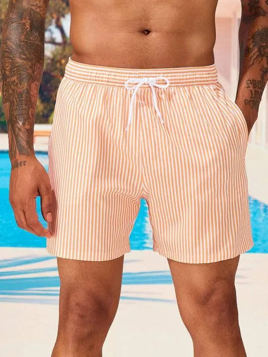 "Costume da bagno uomo a righe blu e bianche, design classico, tessuto leggero per comfort estivo, mare o piscina."