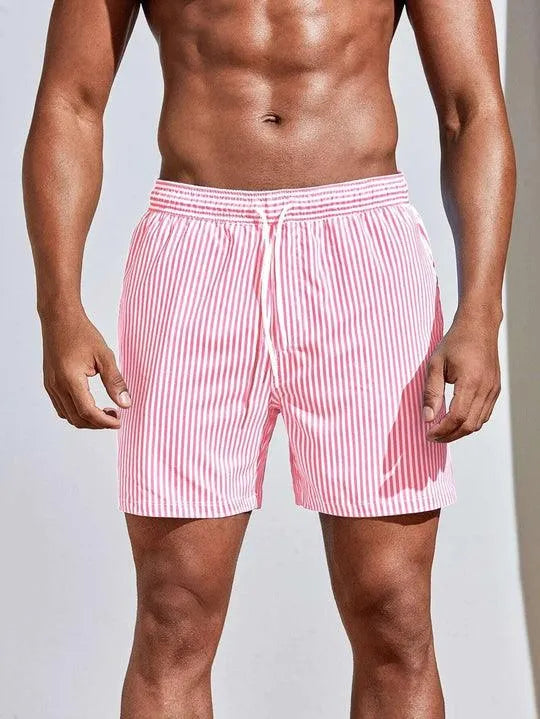 "Costume da bagno uomo a righe blu e bianche, design classico, tessuto leggero per comfort estivo, mare o piscina."
