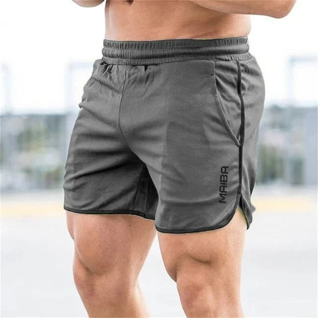 "Costume da bagno uomo slim-fit elasticizzato blu con vita regolabile, cuciture sottili e tessuto a rapida asciugatura."