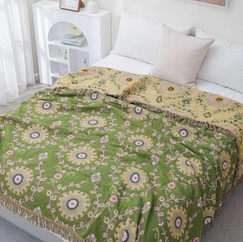 Premium reversible cotton throw blanket featuring a charming Scandinavian bird pattern. Perfect cozy accent for any home.