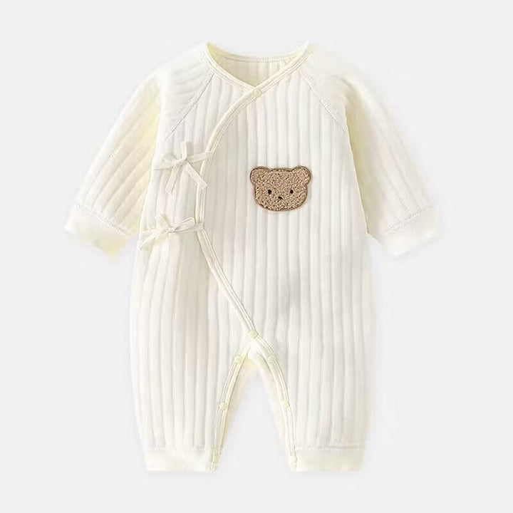 Perfect newborn gift: soft baby bodysuit with sweet bear applique for cozy and comfortable wear.