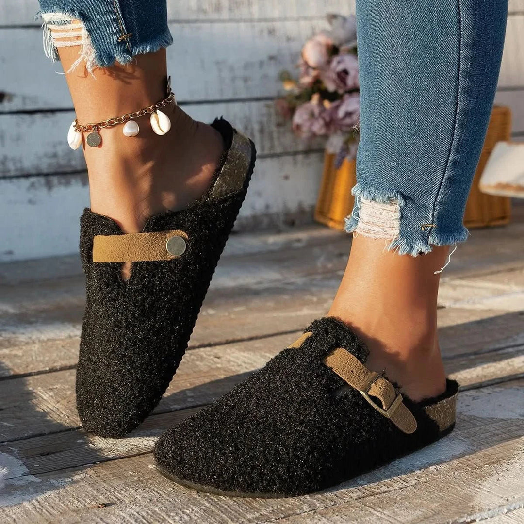 Stylish women's warm slip-on mules, ultimate comfort for winter indoor footwear.