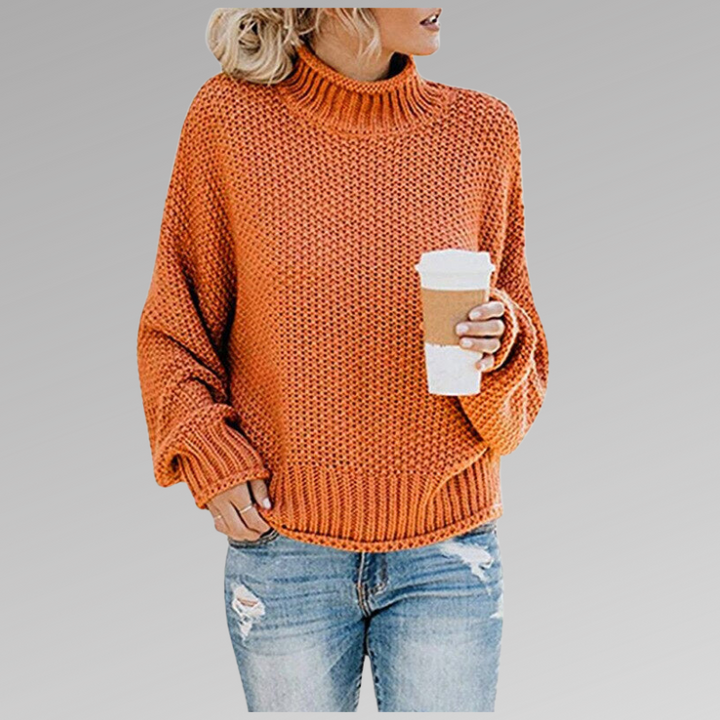 Cozy women's oversized turtleneck sweater, perfect for everyday comfort in fall/winter.