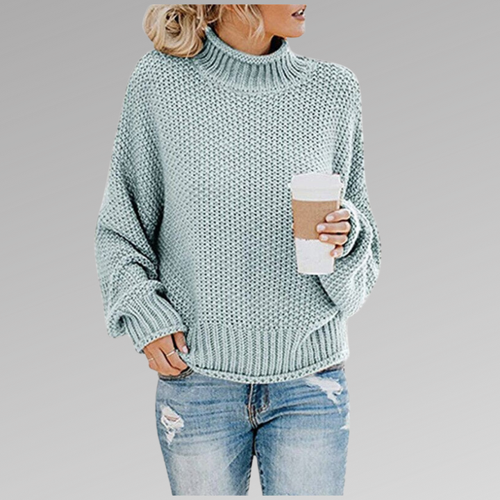 Trendy women's oversized turtleneck sweater, a cozy long sleeve perfect for fall & winter fashion.