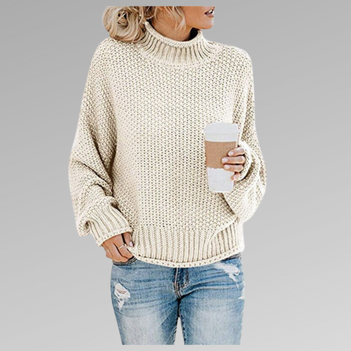 Versatile women's oversized turtleneck sweater, a warm & cozy long sleeve for casual fall/winter outfits.