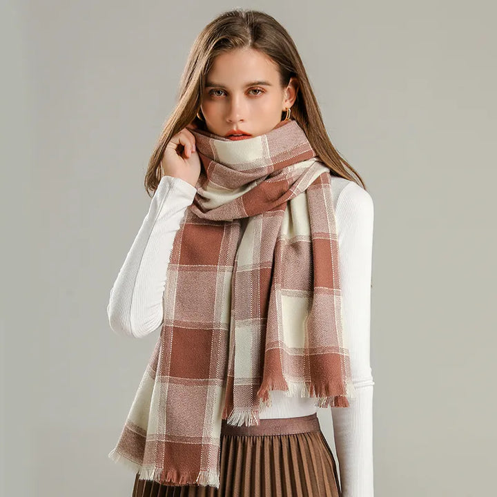 Fashionable women's plaid cashmere scarf. Cozy winter accessory with a classic checked pattern. Warm & stylish.