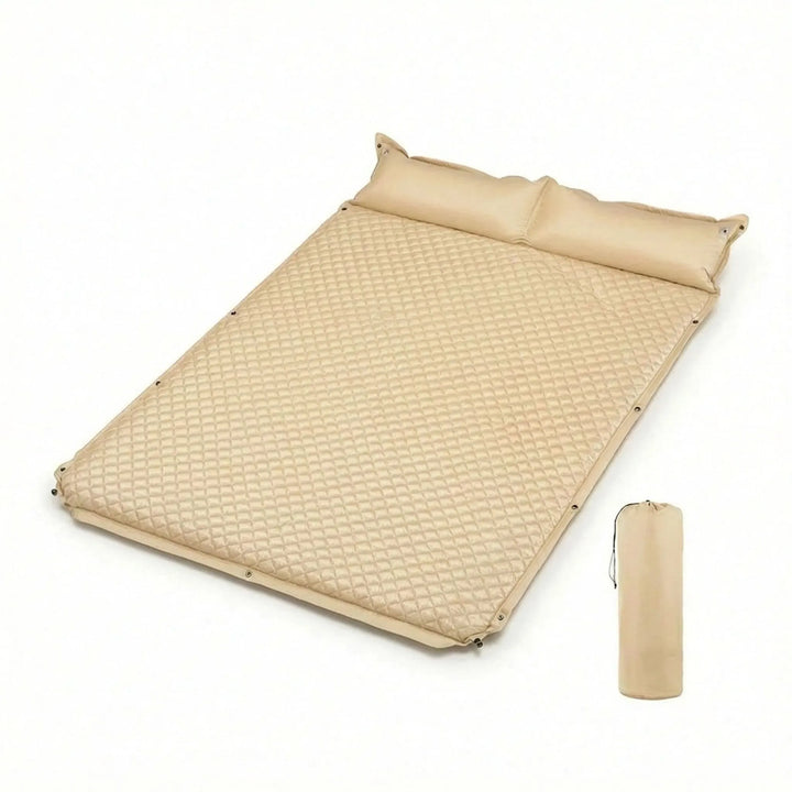 Comfortable cream self-inflating camping sleeping pad with pillow, ideal for hiking, travel & backpacking.