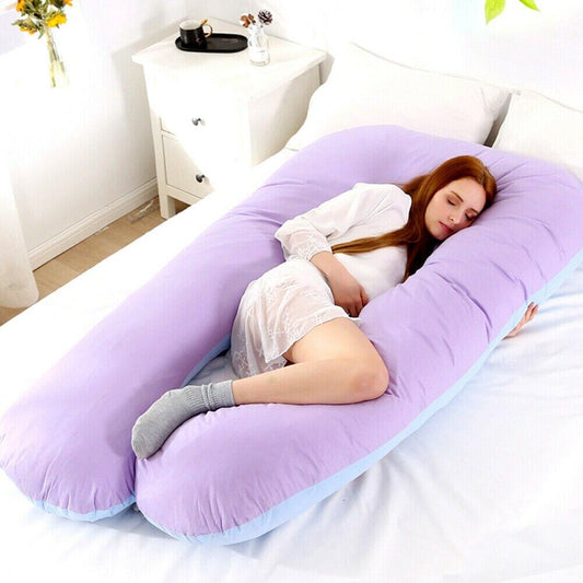 "Cuscino corpo in cotone organico, oversize e ergonomico, per supporto della colonna; promuove un allineamento corretto."