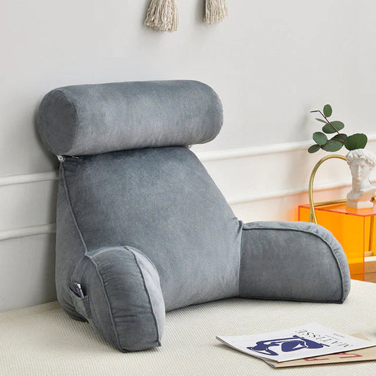 "Cuscino da lettura ergonomico in velluto con braccioli, design morbido e avvolgente per comfort ottimale."